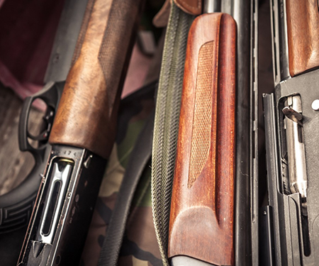 several guns on a table